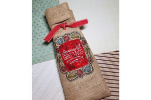 Read more about the article ITH Seasons Greetings Wine Bag